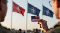 Trump renews Greenland threats at NATO summit, says U.S. could remove troops from Europe